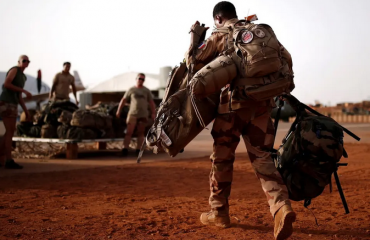 French army watches for bombs and potholes as it withdraws from Mali base